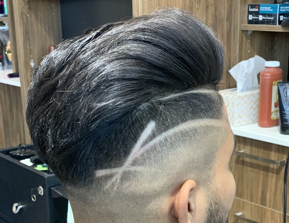 Cabello masculino con diseño hecho a navaja